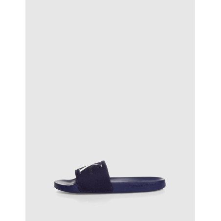 CHANCLA CALVIN KLEIN SLIDE MONORAM CO MARINO